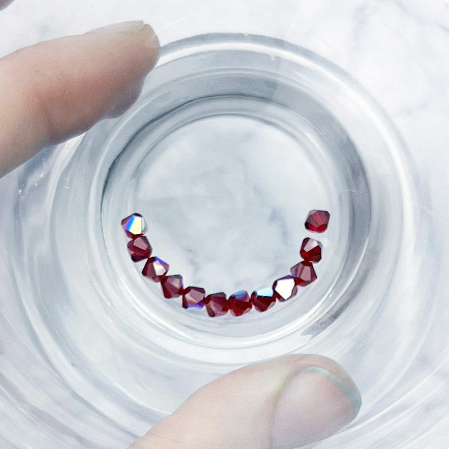 4mm Swarovski Dark Siam Red AB Bicone Bead Pack (10 Beads) F3