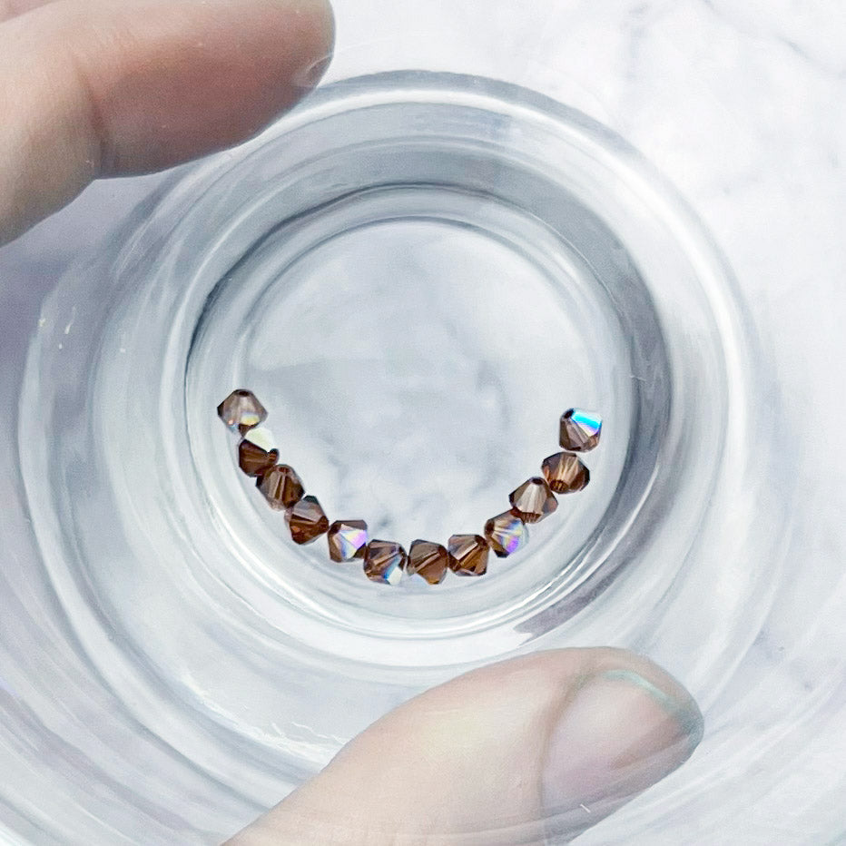 4mm Swarovski Smoked Topaz AB Bicone Bead Pack (10 Beads) Q3