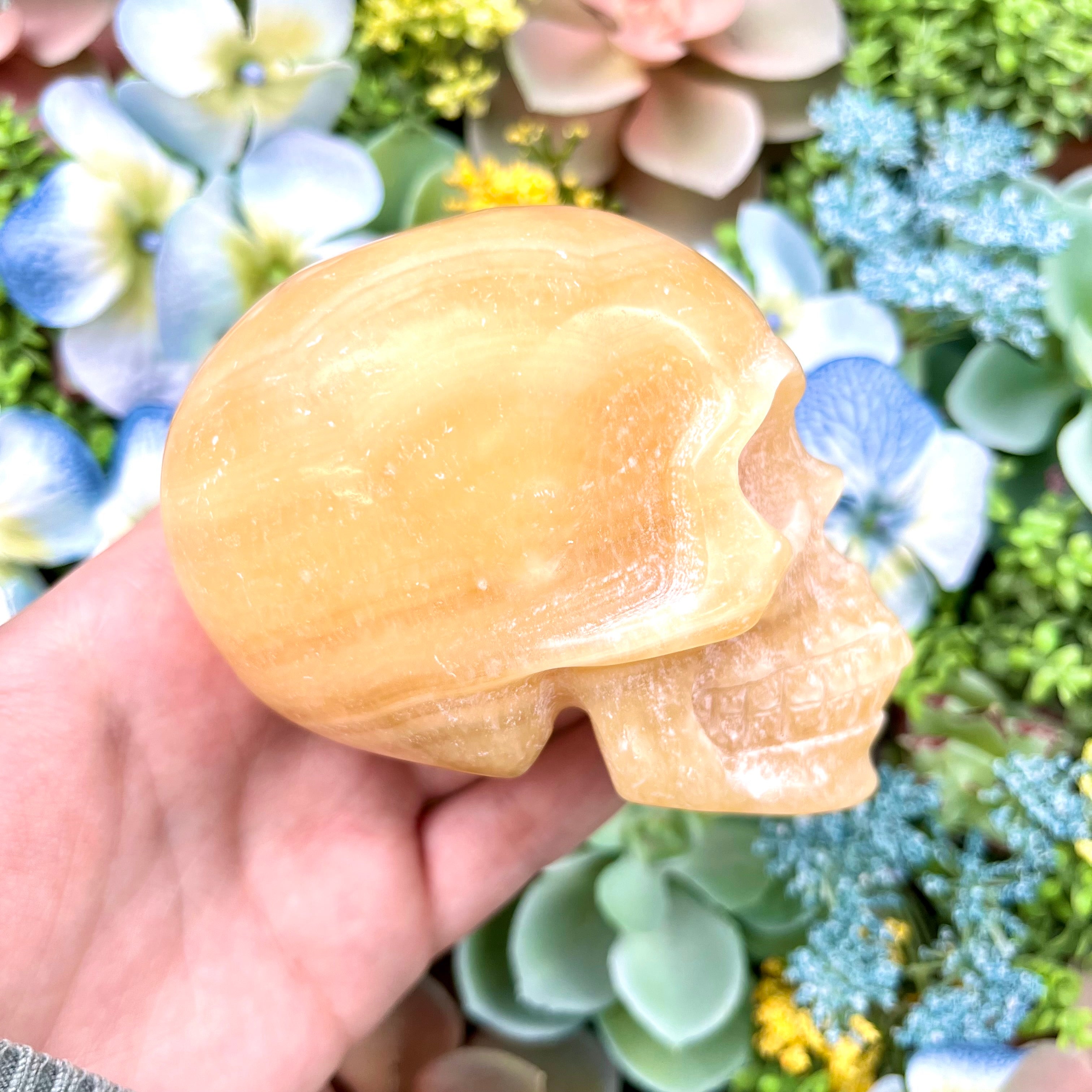 3.25 Inch Orange Calcite Skull E190