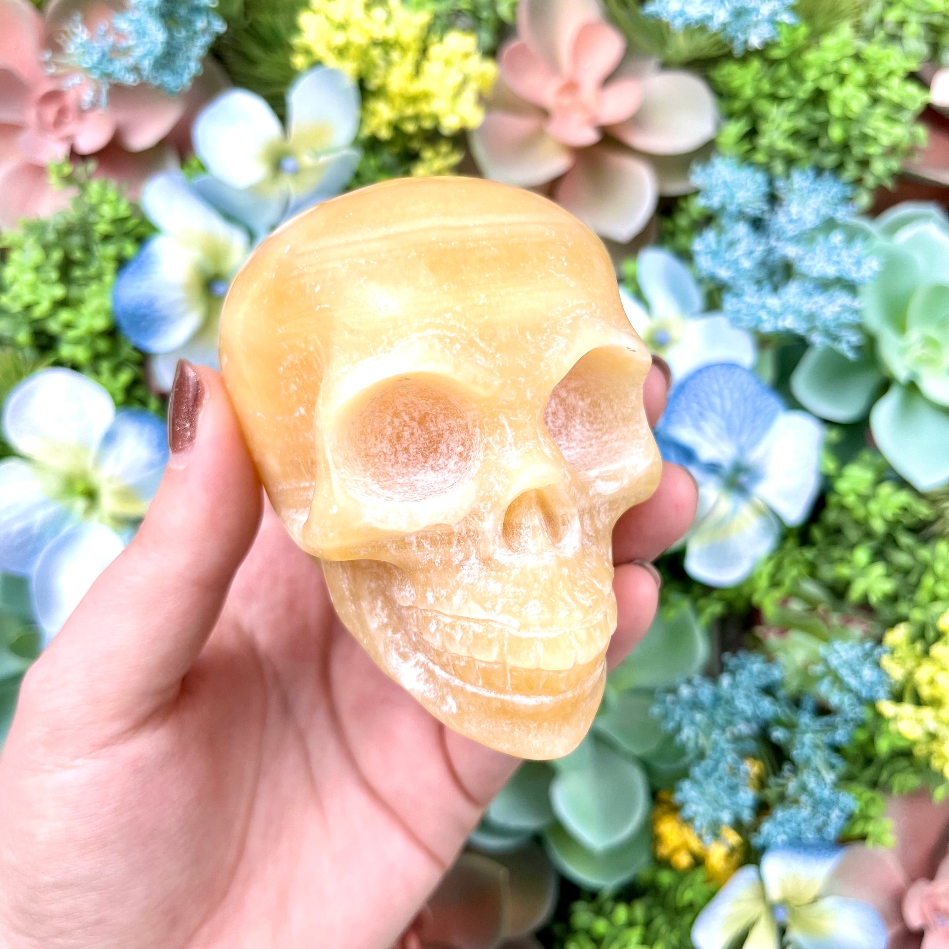 3.25 Inch Orange Calcite Skull E190