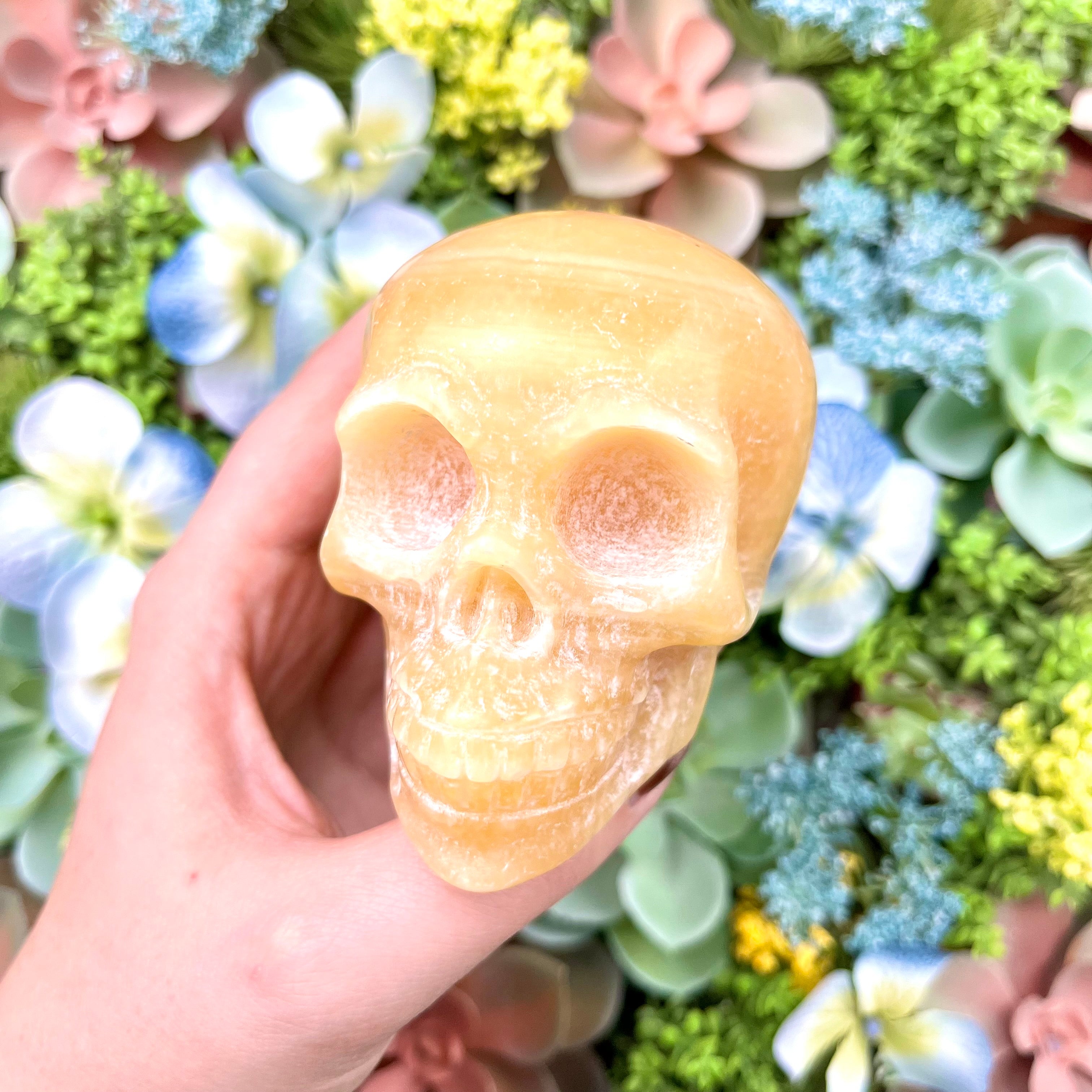 3.25 Inch Orange Calcite Skull E190
