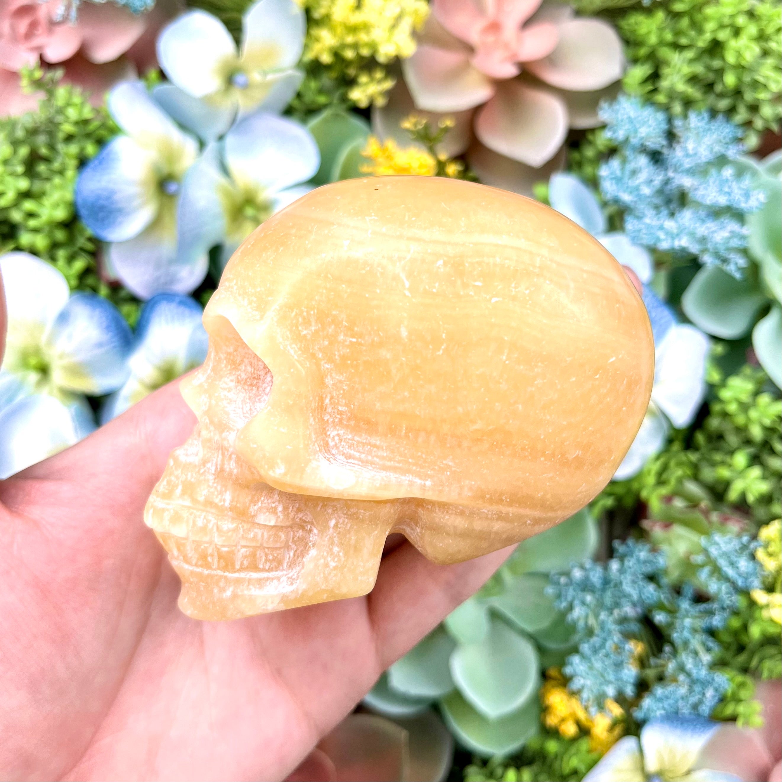 3.25 Inch Orange Calcite Skull E190
