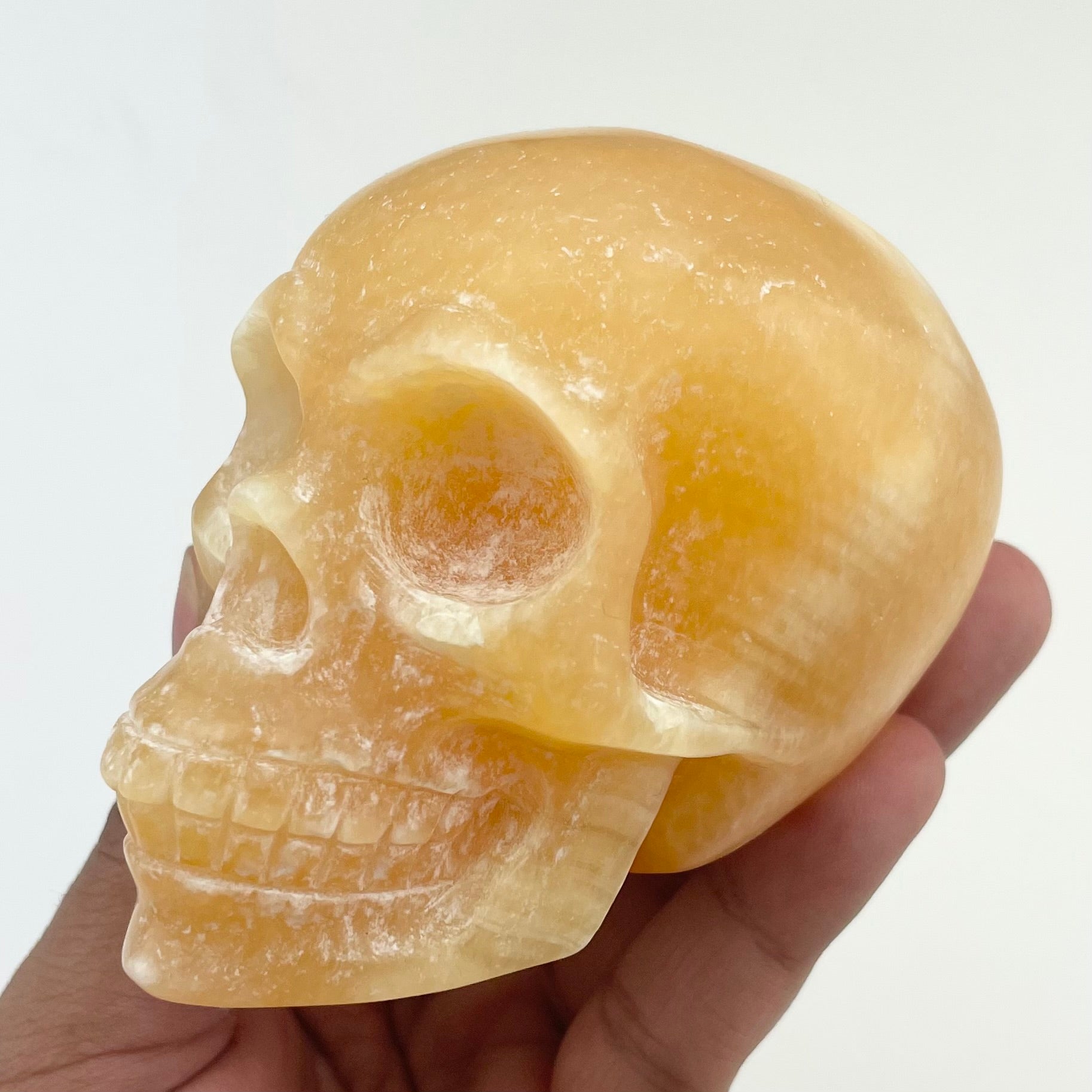 3.25 Inch Orange Calcite Skull I190