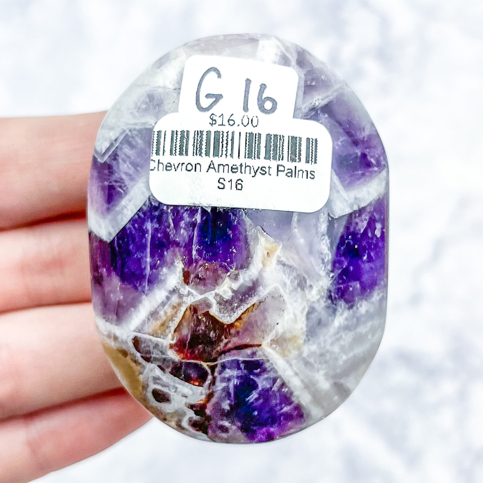 2.25 Inch Chevron Amethyst Palmstone G16