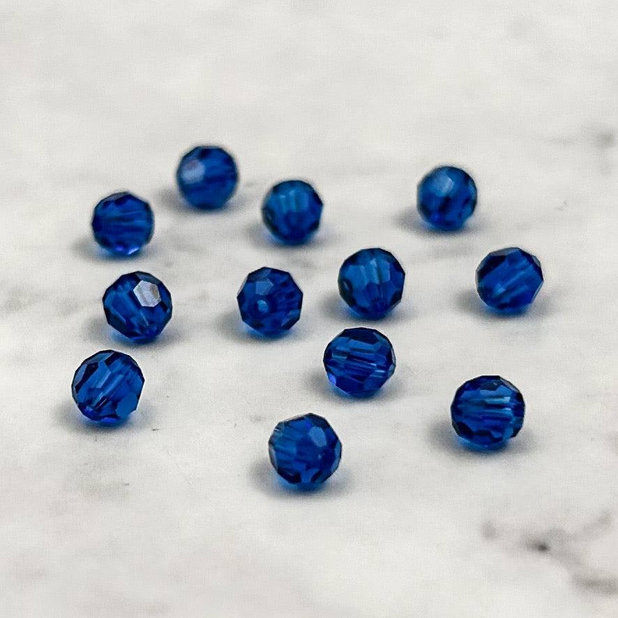 4mm Swarovski Capri Blue Faceted Bead Pack (12 Beads)