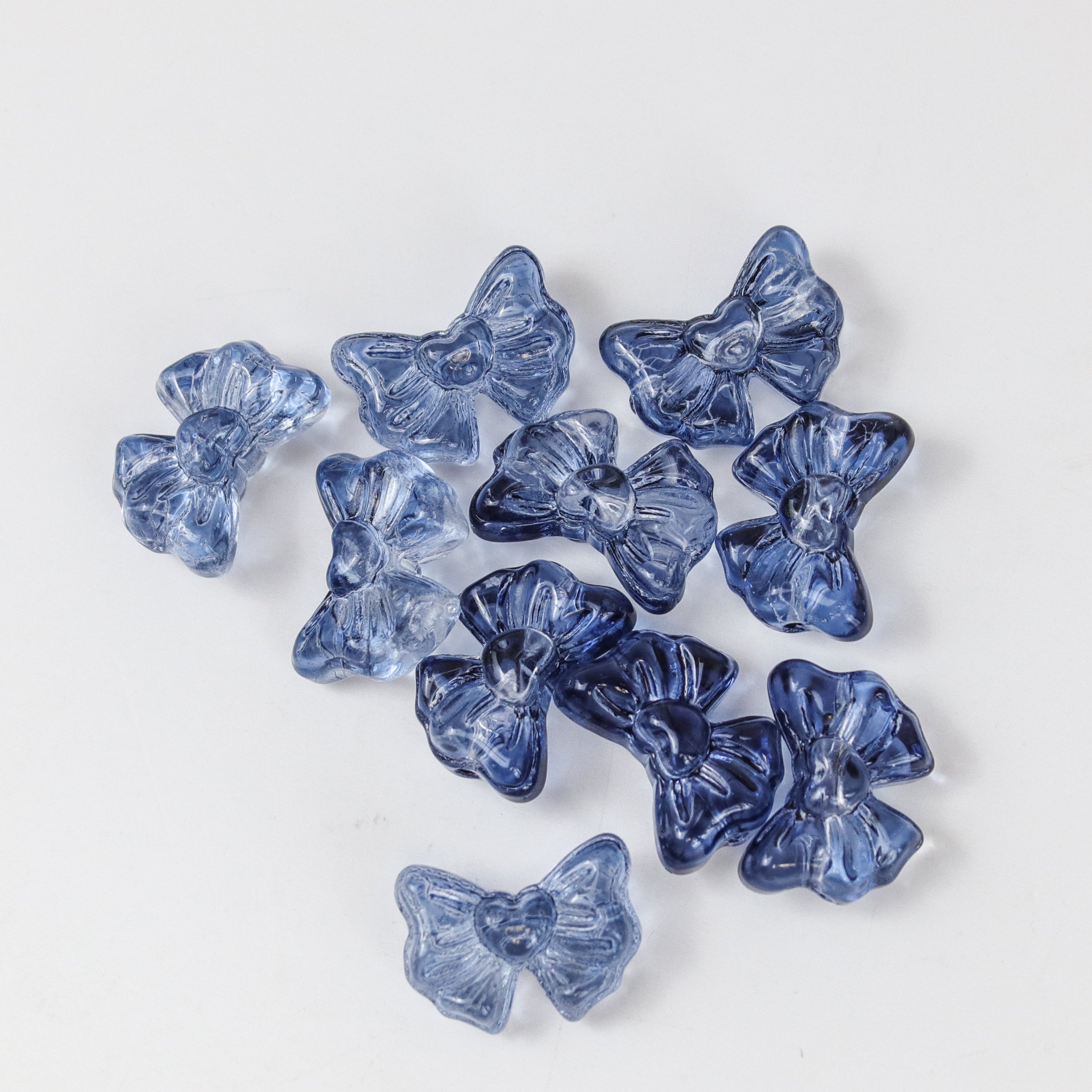 13x17mm Dark Blue Glass Bow Bead Pack (10 Beads) $2.00