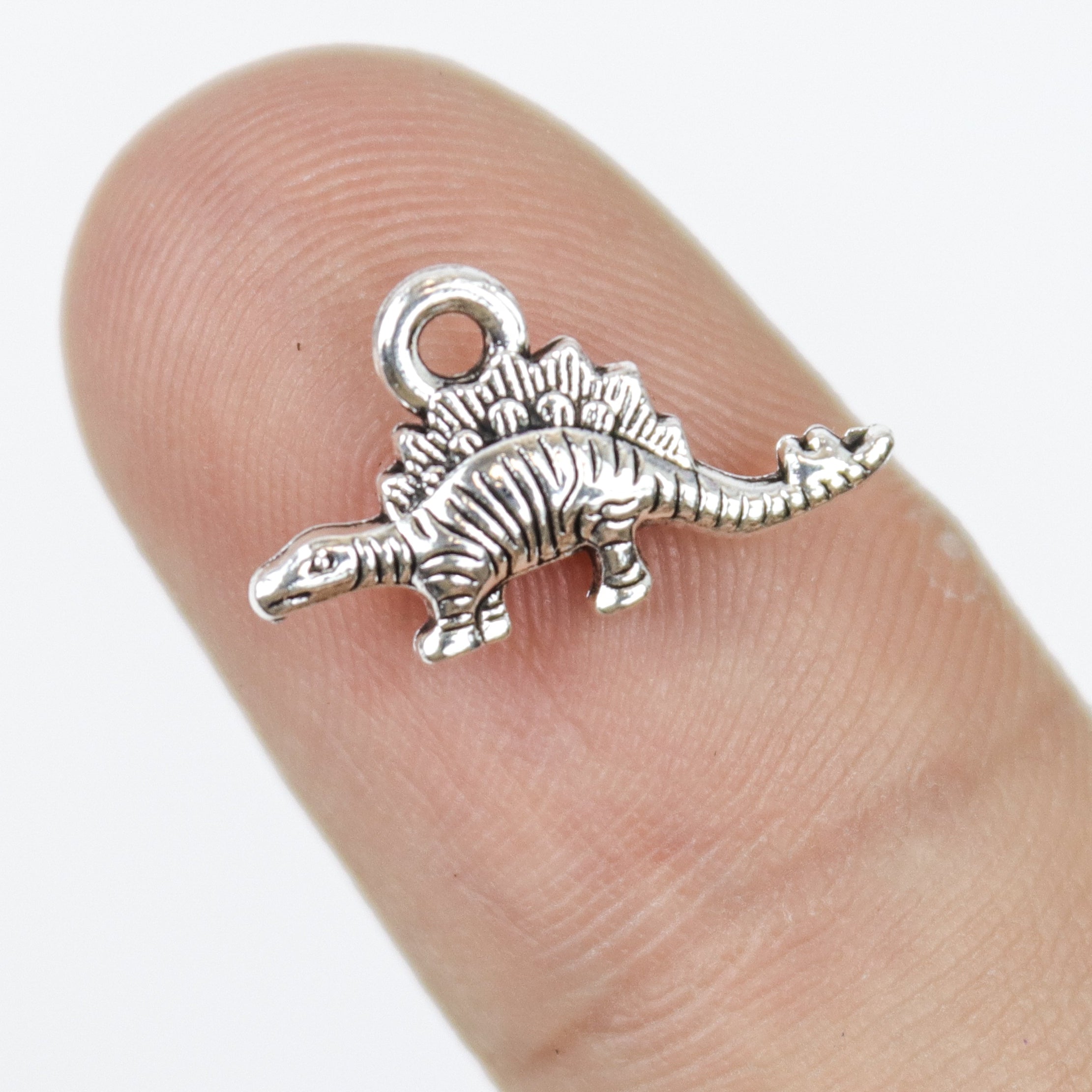 $1.50 Tiny Stegosaurus Alloy Charm Pack (5 Charms)