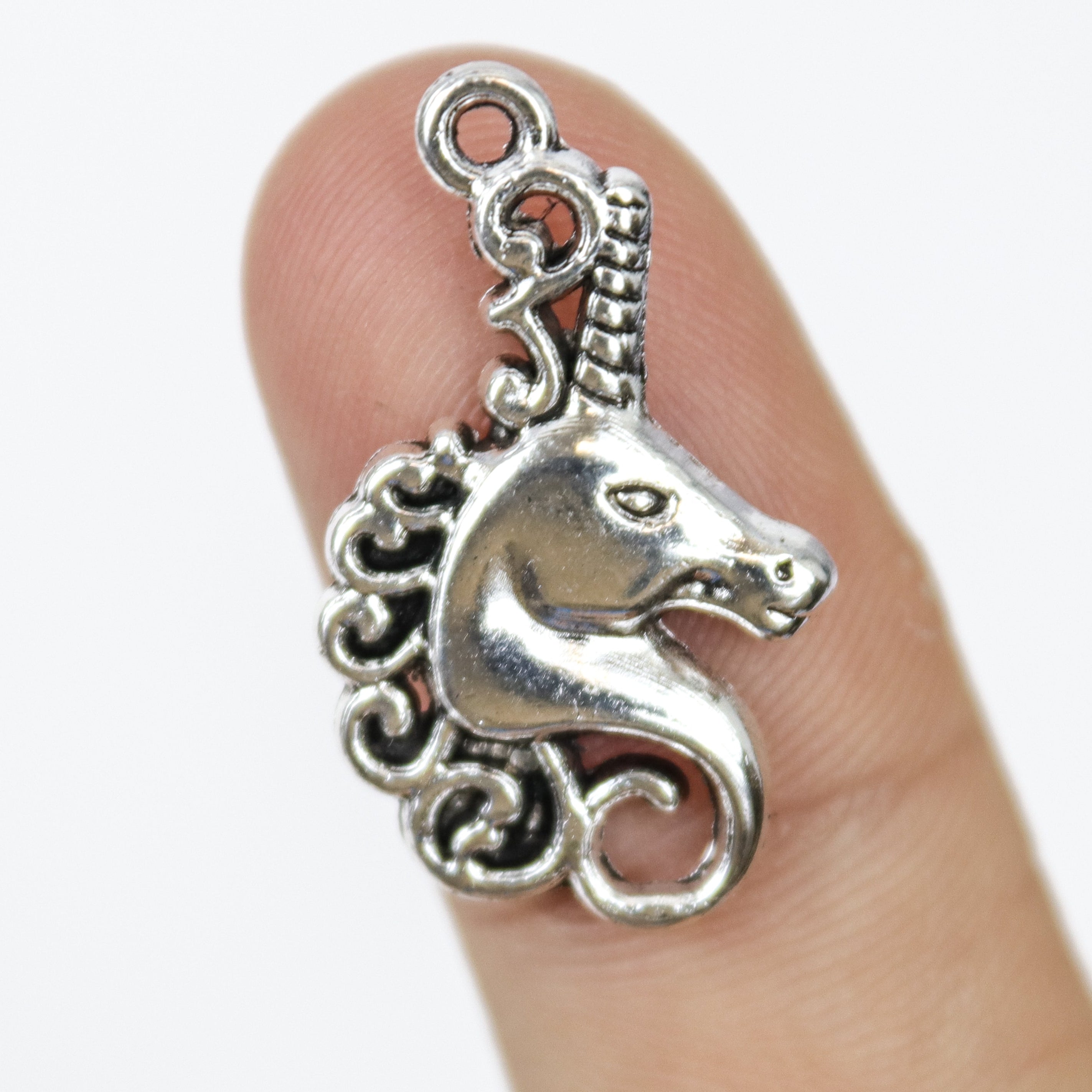 $1.50 Unicorn Head Alloy Charm Pack (5 Charms)