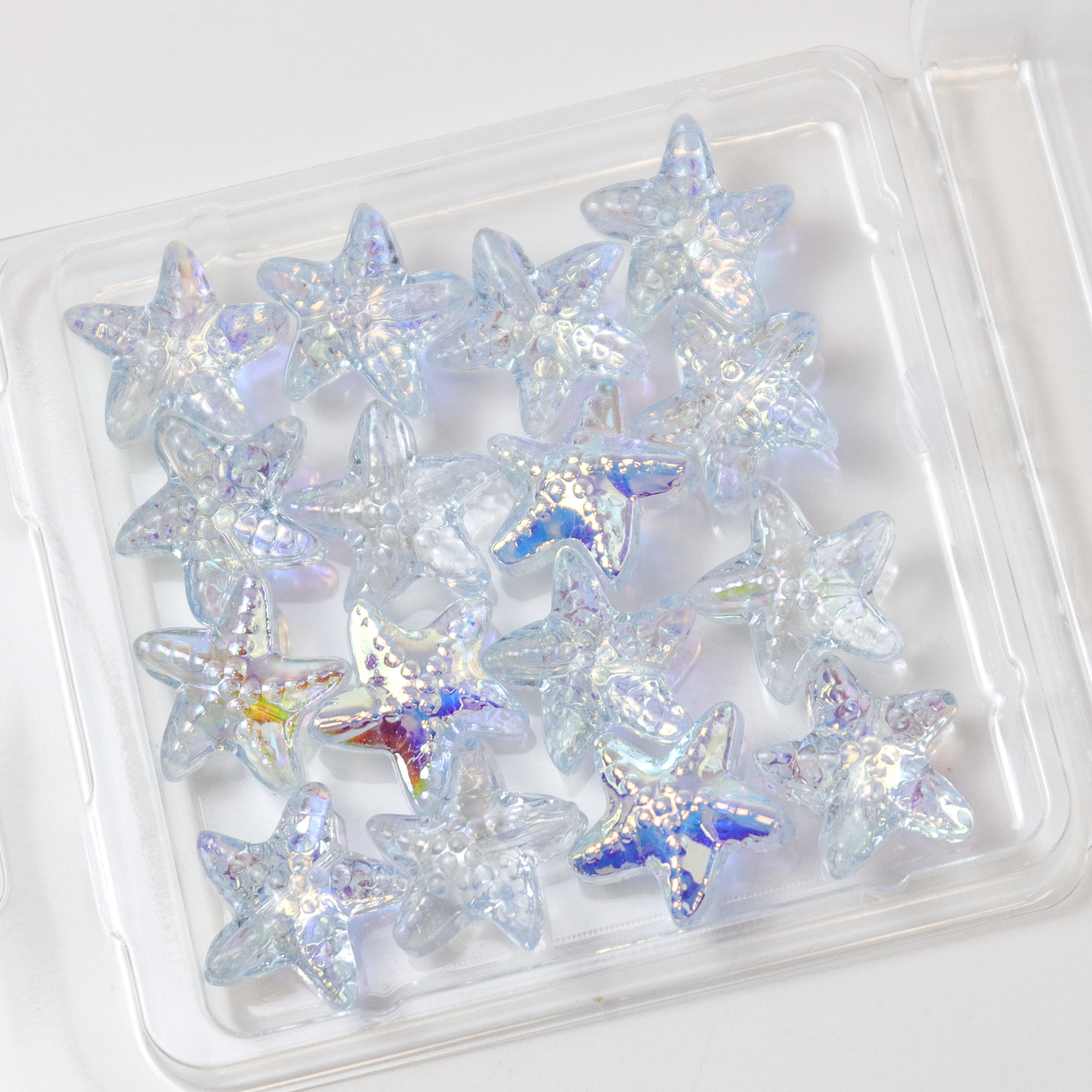 15mm Light Blue Glass Starfish 16-Bead Pack $3.00
