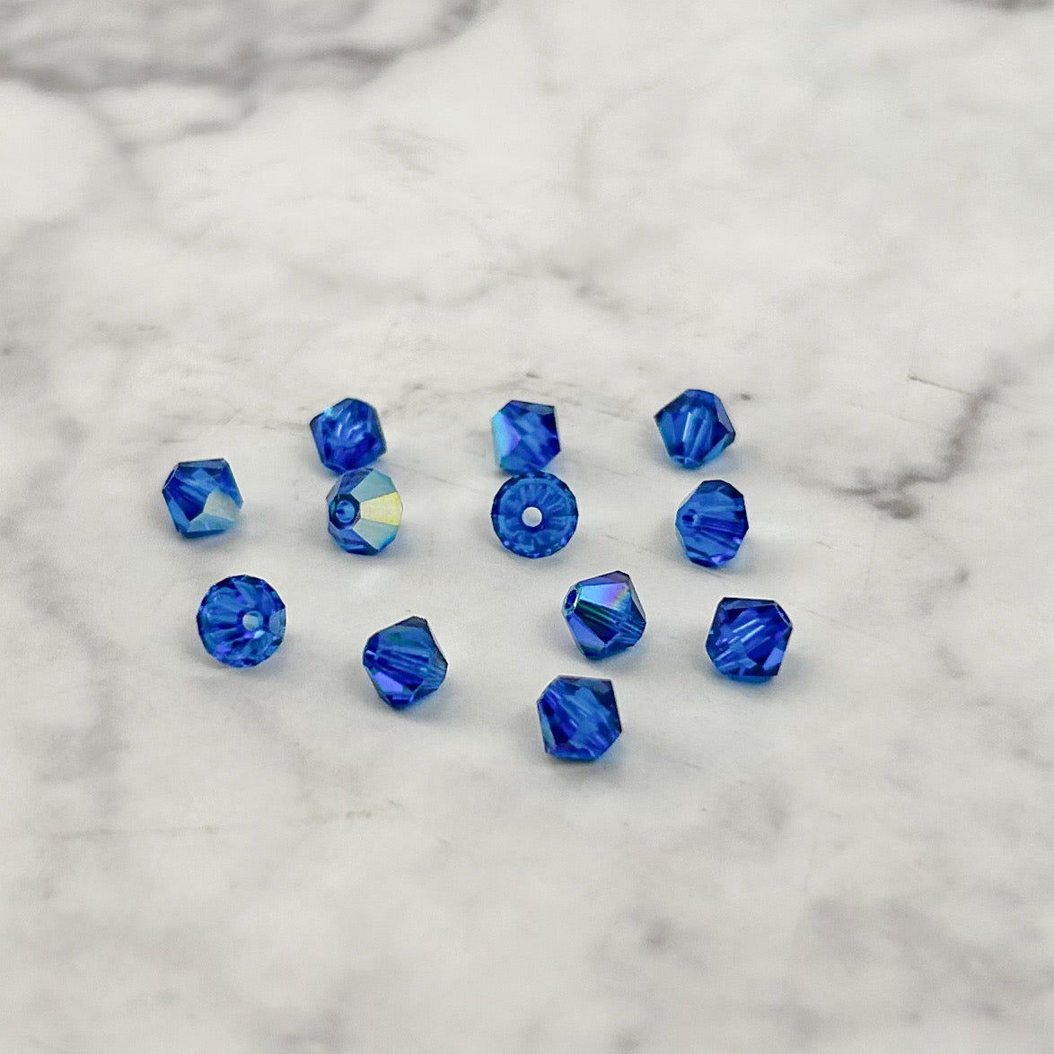 4mm Swarovski Capri Blue Aura Plated Bead Pack (12 Beads)