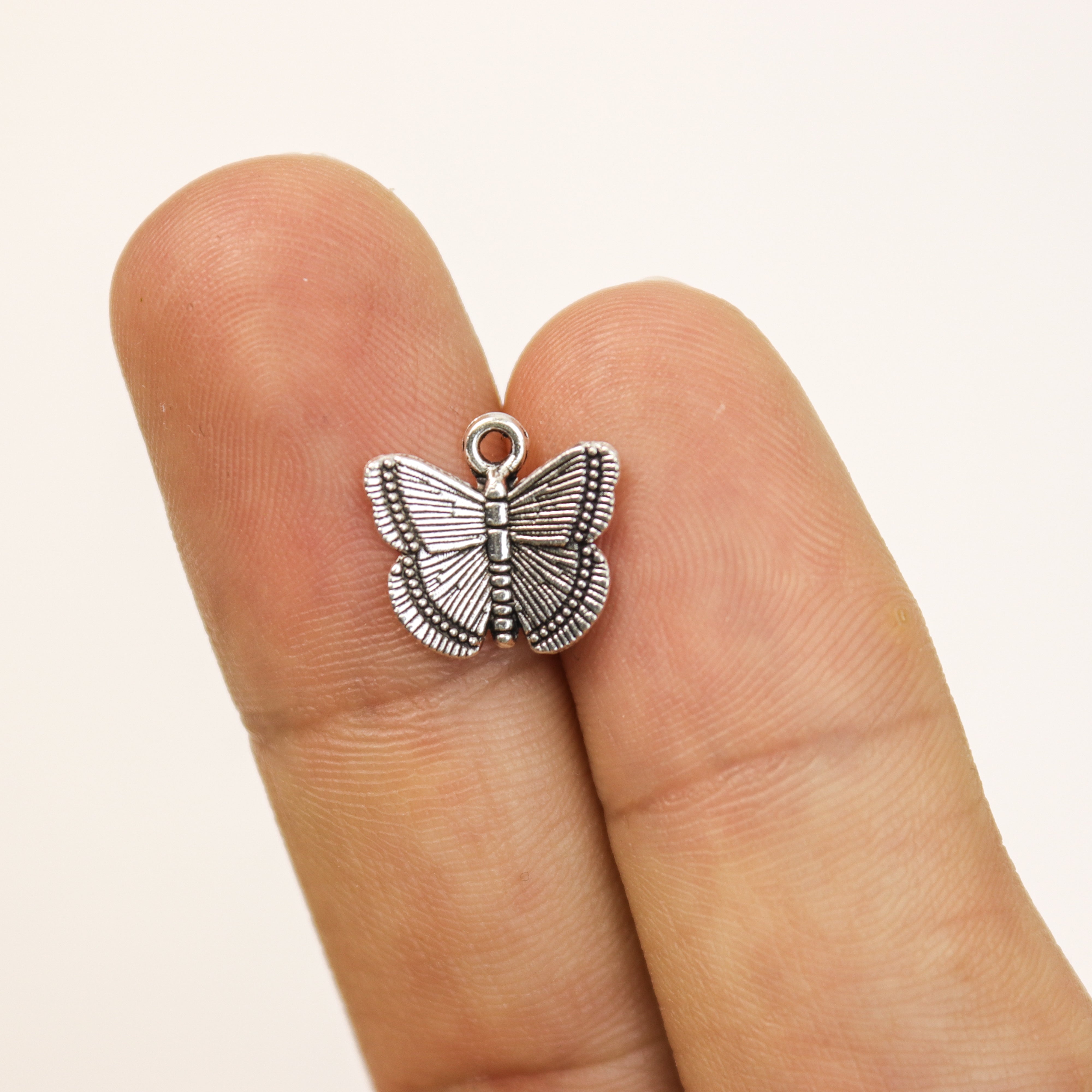 $1.50 Metal Butterfly Alloy Charm Pack (5 Charms)