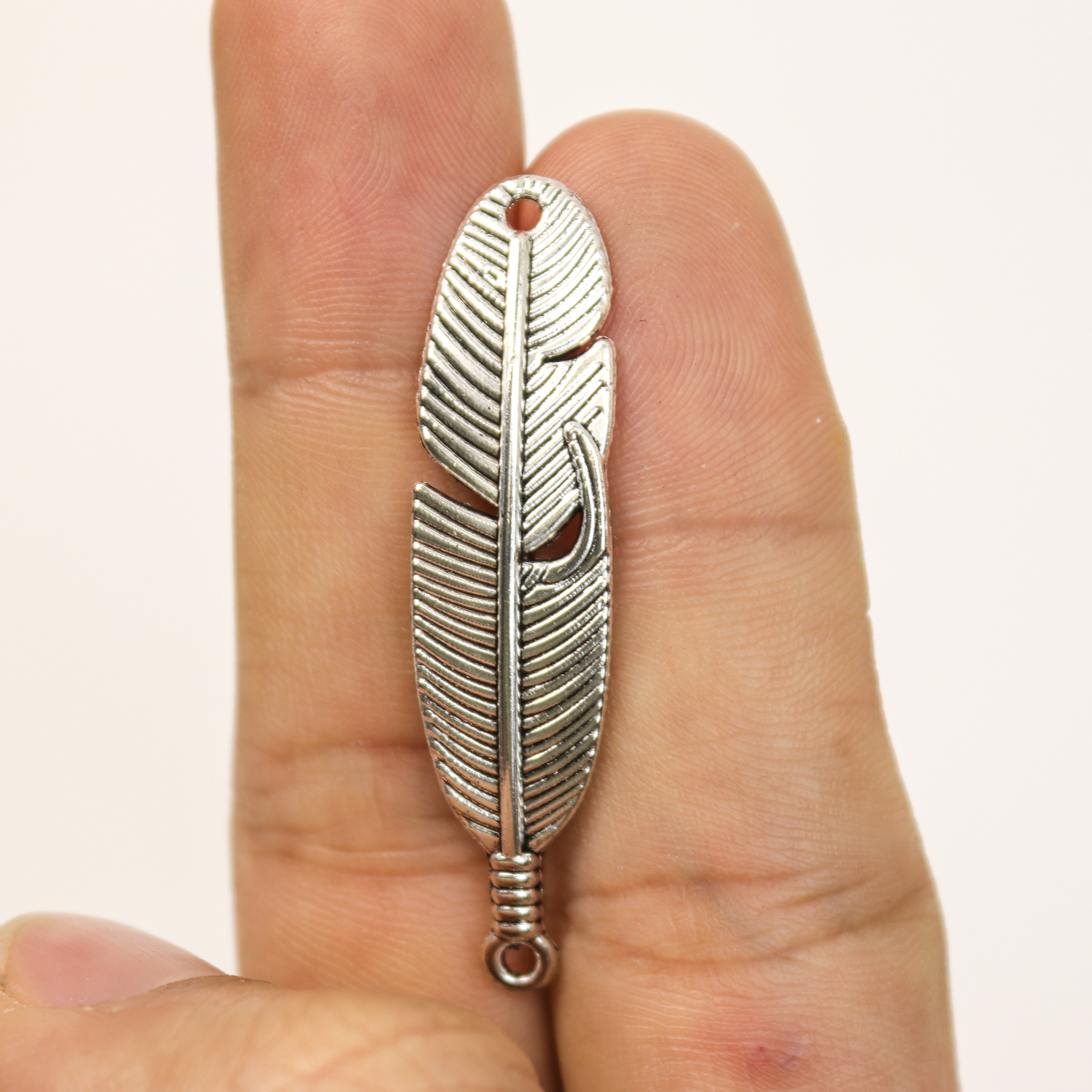 $1.50 Metal Feather Alloy Charm Pack (5 Charms)