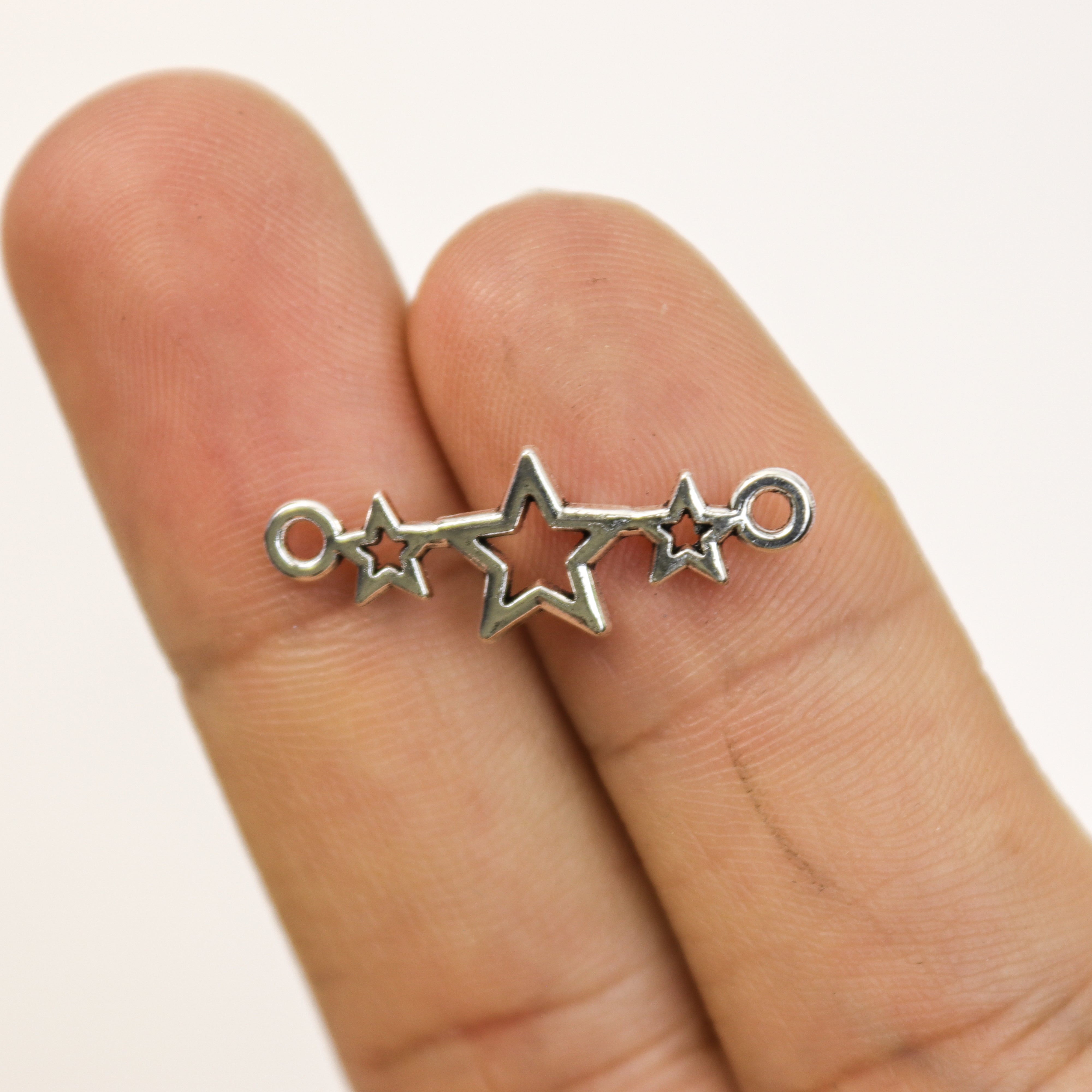 $1.50 Triple Star Alloy Charm Pack (5 Charms)