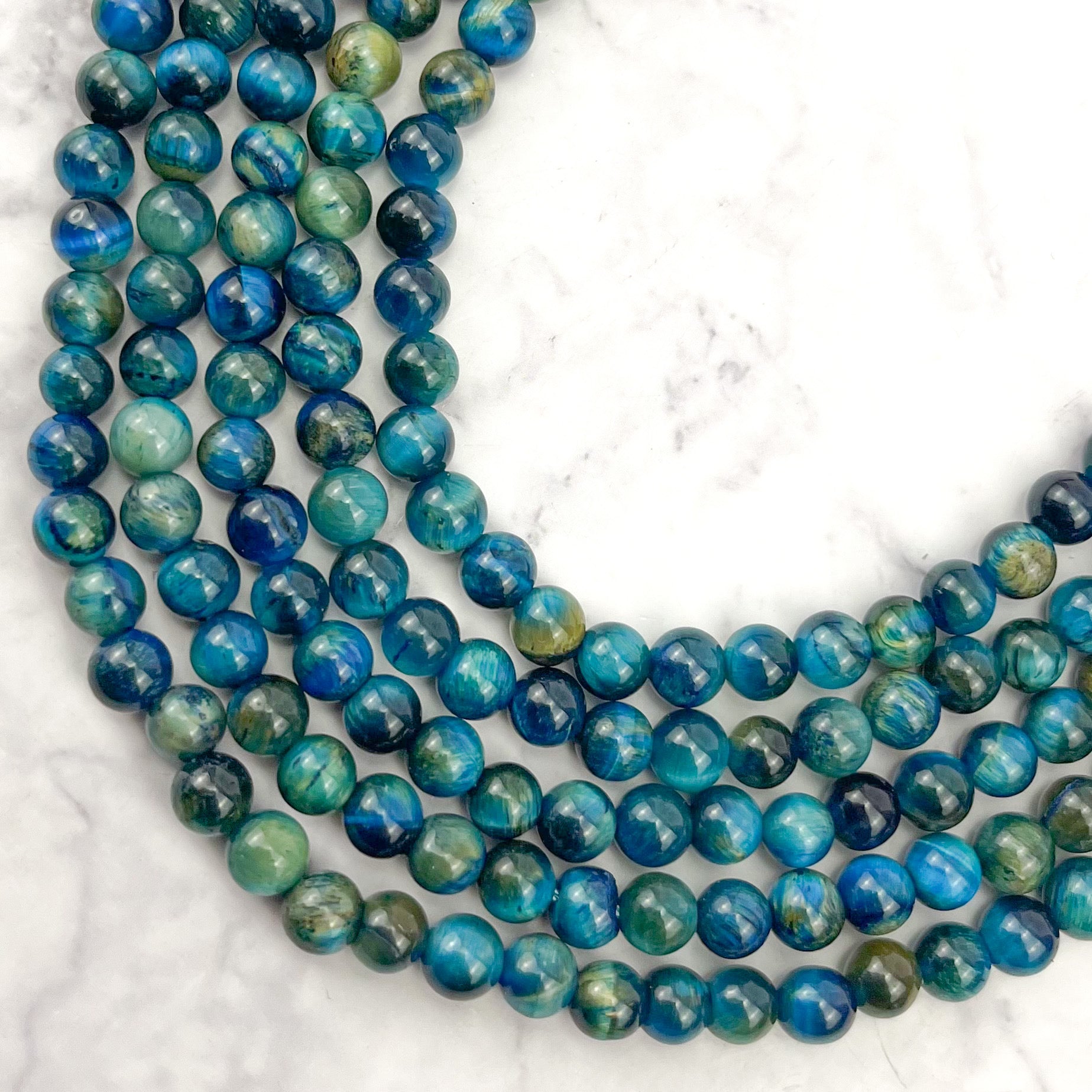 6mm Dyed Teal Tigers Eye Bead Strand
