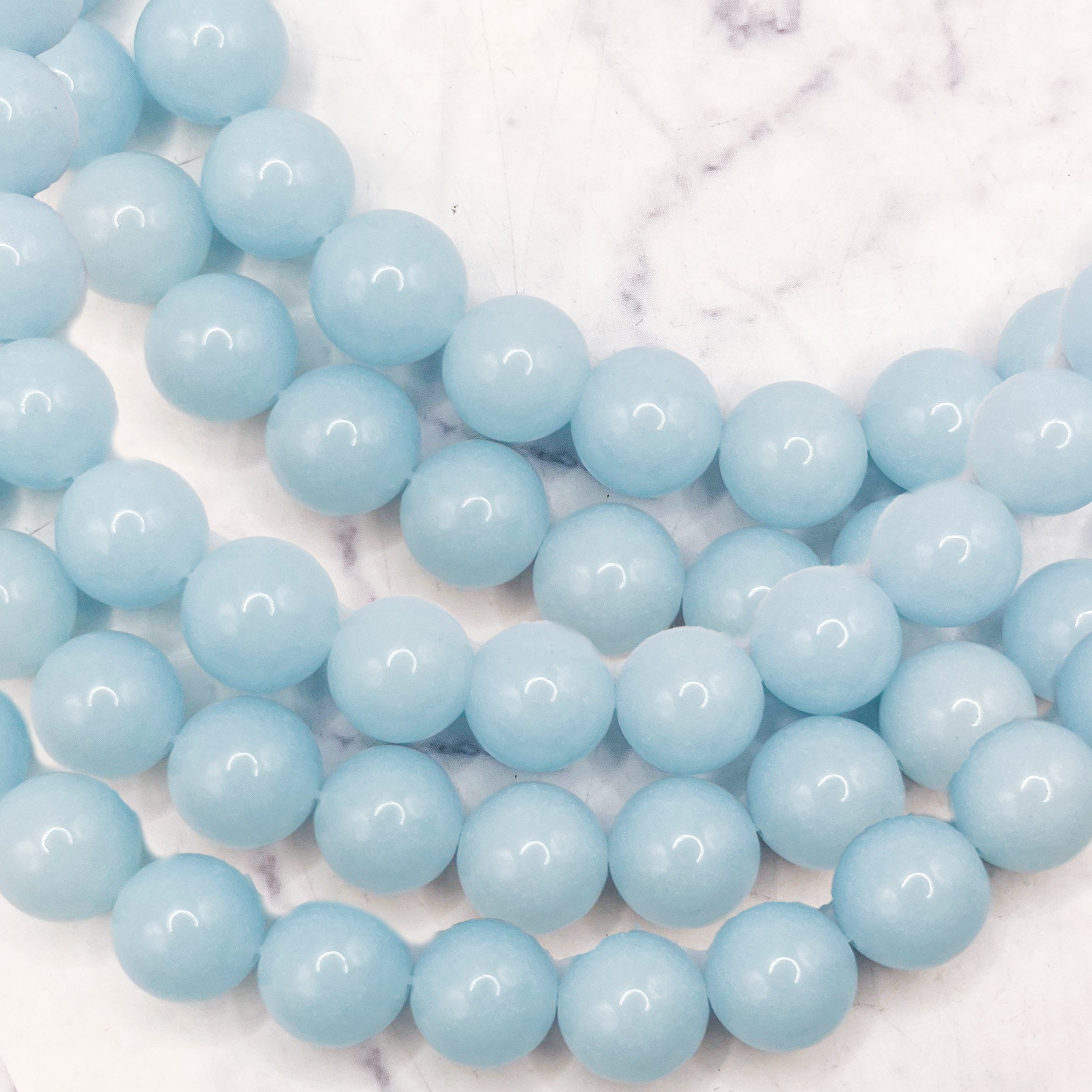 10mm Ice Blue Glow In The Dark Bead Half Strand X8