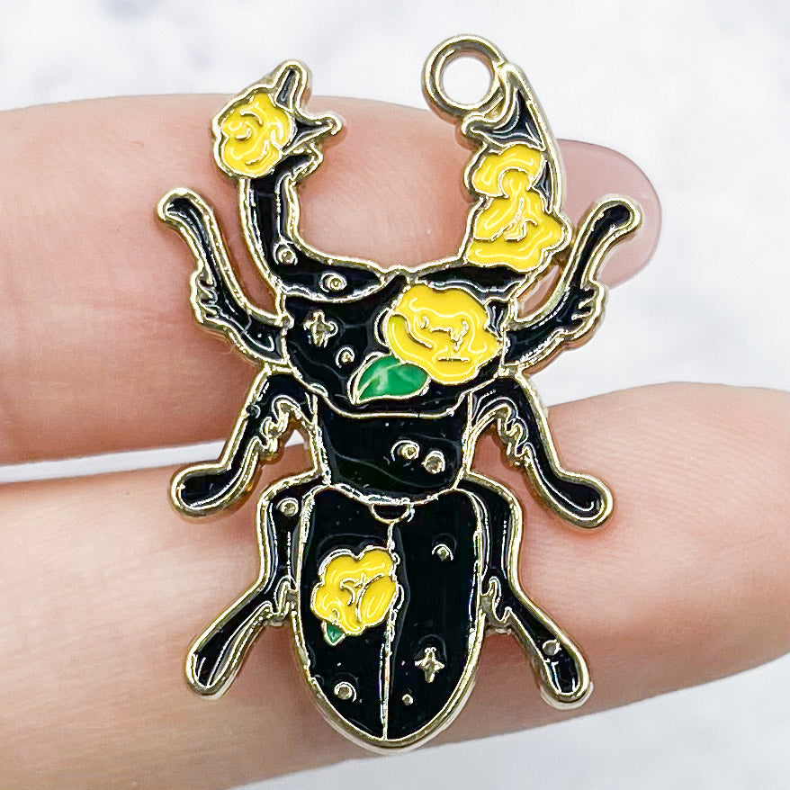 30mm Black and Yellow Floral Beetle Charm D25