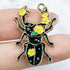 30mm Black and Yellow Floral Beetle Charm D25