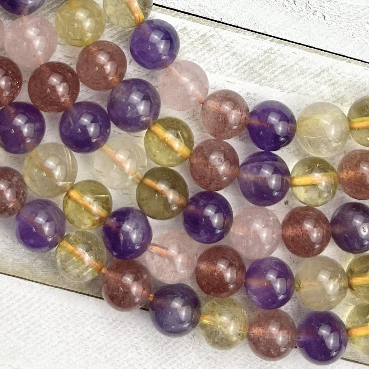8mm Amethyst Golden Healer Bead Strand