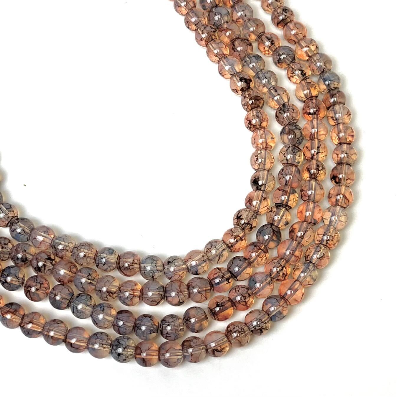 8mm Orange/Clear Glass Bead Strand 30" Loop $4.00