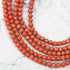 6mm Dyed Orange Magnesite Bead Strand