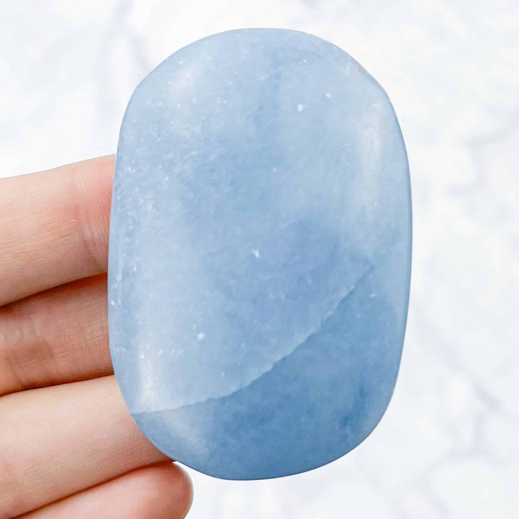 2.25 Inch Angelite Palmstone Q18