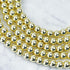 6mm Bright Gold Hematite Bead Strand