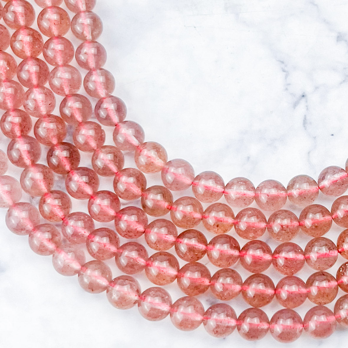 6mm Strawberry Quartz Half Bead Strand