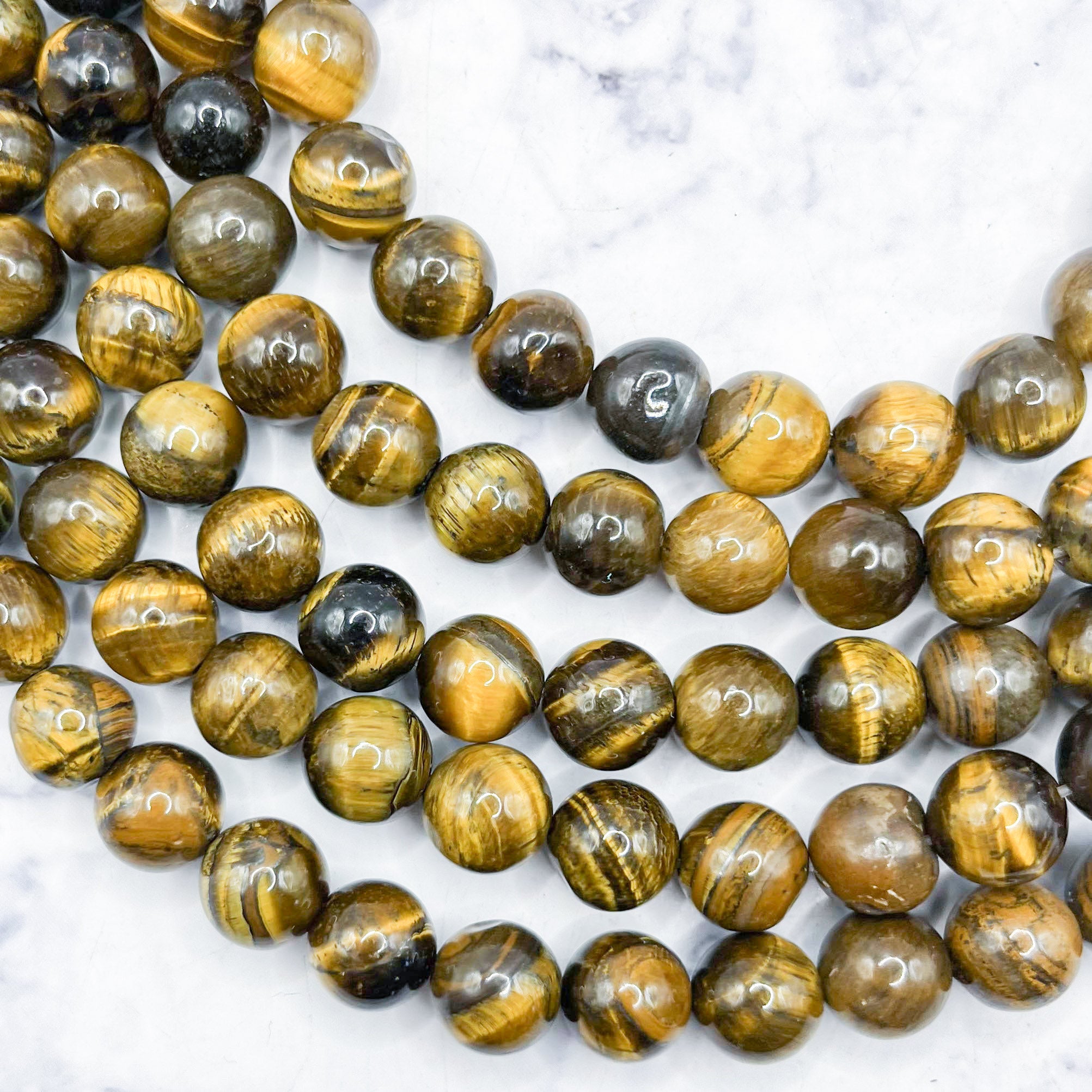 10mm Tiger's Eye Bead Strand F12