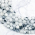 8mm Rainbow Moonstone with Tourmaline Bead Half Strand G16