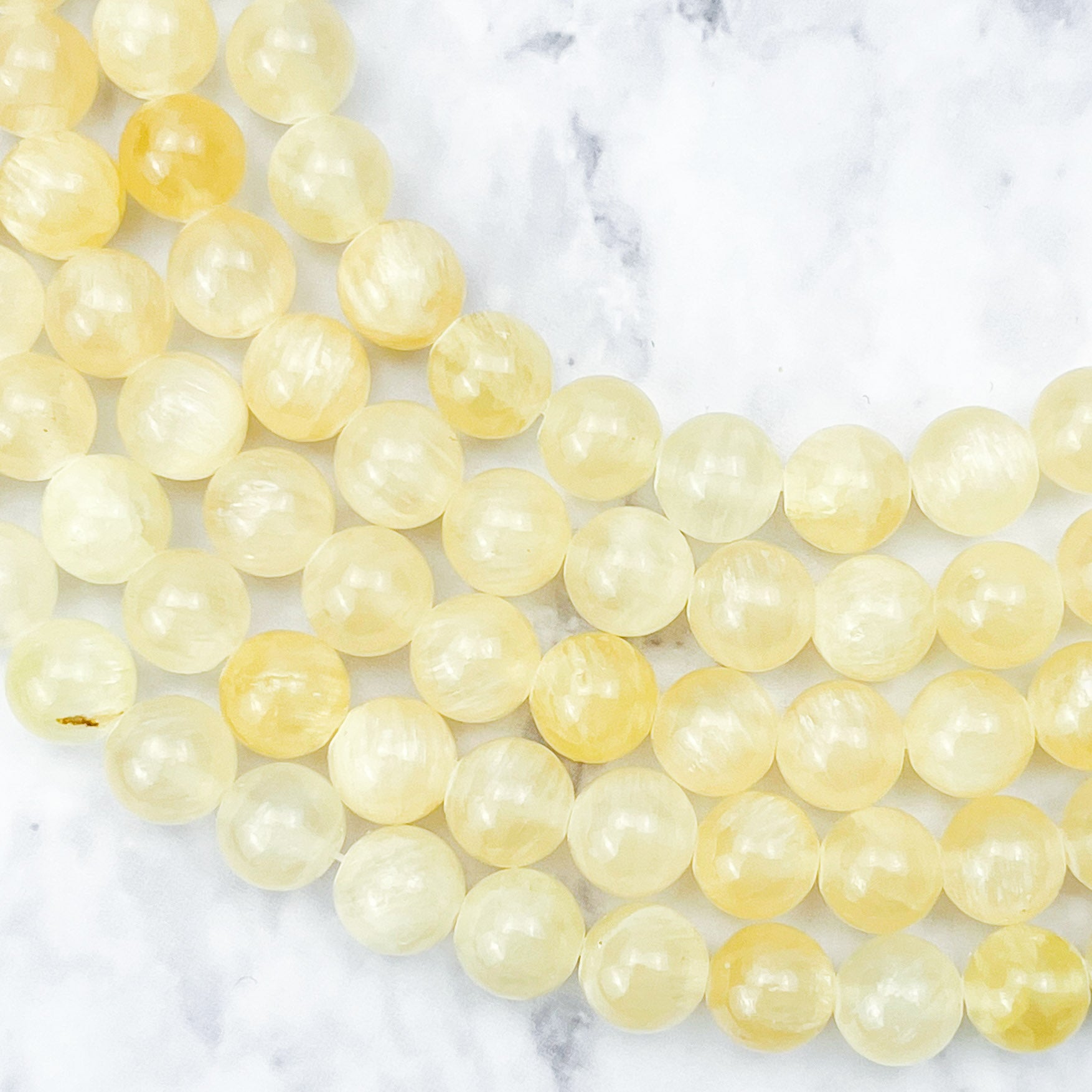8mm Yellow Selenite Bead Half Strand M22