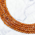 2.5mm HQ Faceted Hessonite Garnet Bead Strand G16