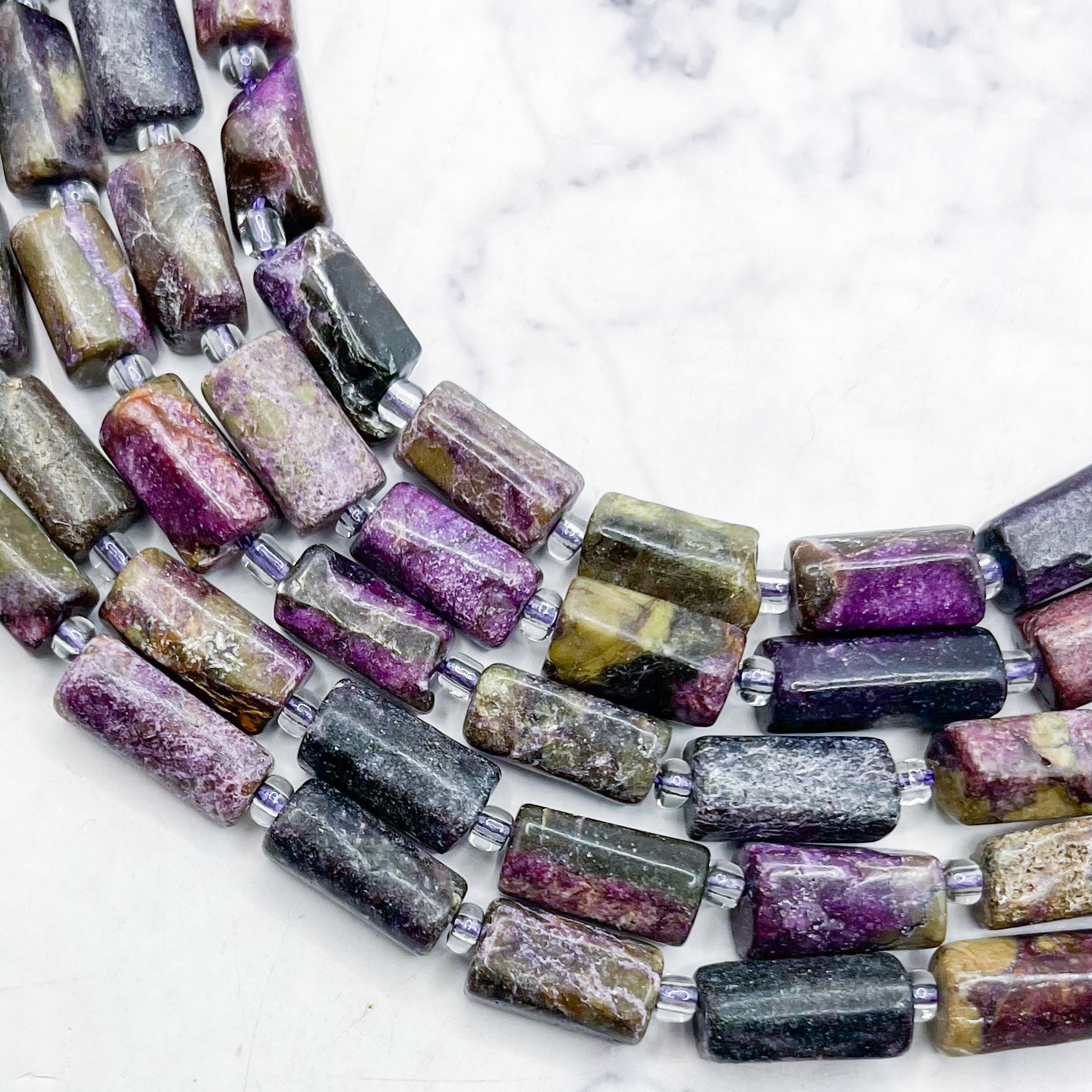 6x11mm Faceted Atlantisite Barrel Bead Half Strand B16
