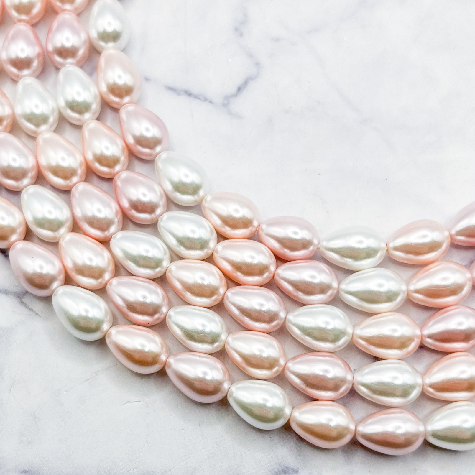 6x9mm Pink and White Pearlized Shell Drop Bead Half Strand D7