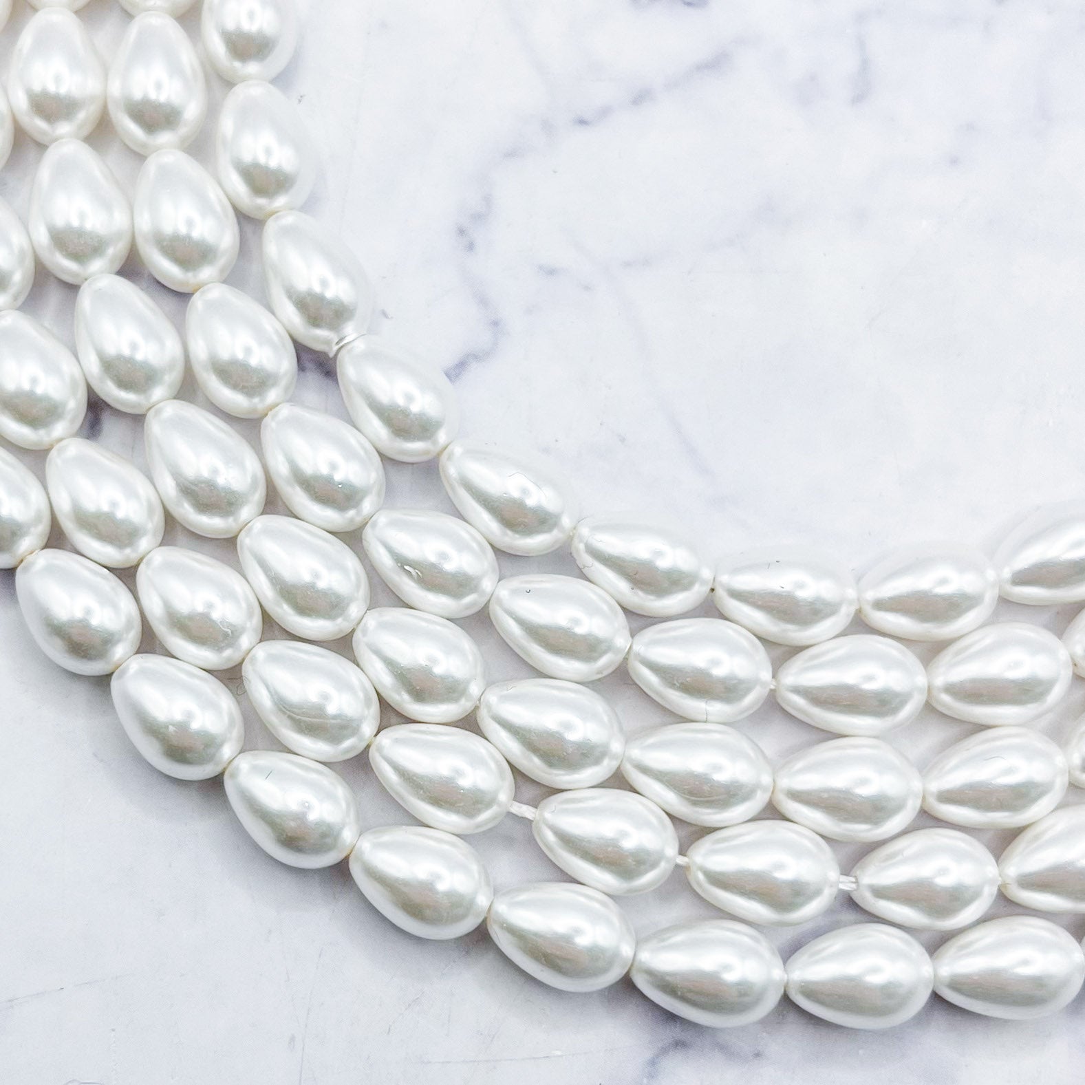 6x9mm White Pearlized Shell Drop Bead Half Strand C7