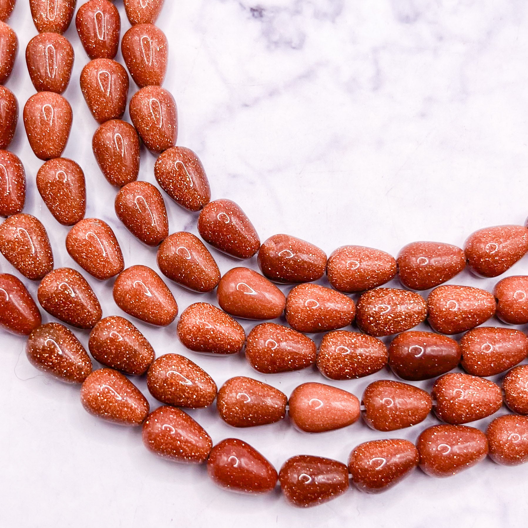 6x9mm Copper Goldstone Drop Bead Half Strand N8