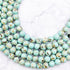 8mm Dyed Teal Shell Howlite Bead Strand F13