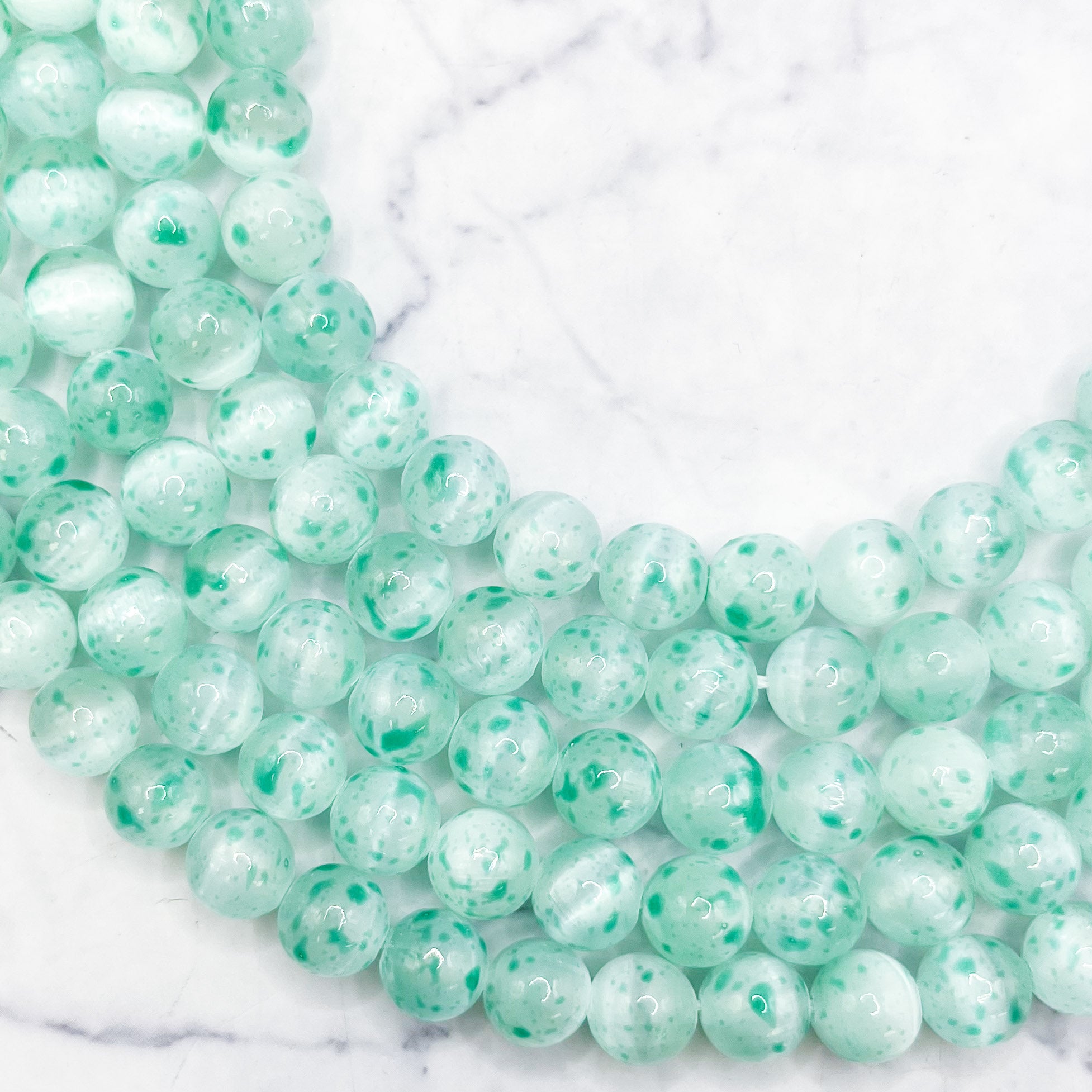 8mm Dyed Green Speckled Selenite Bead Strand S28