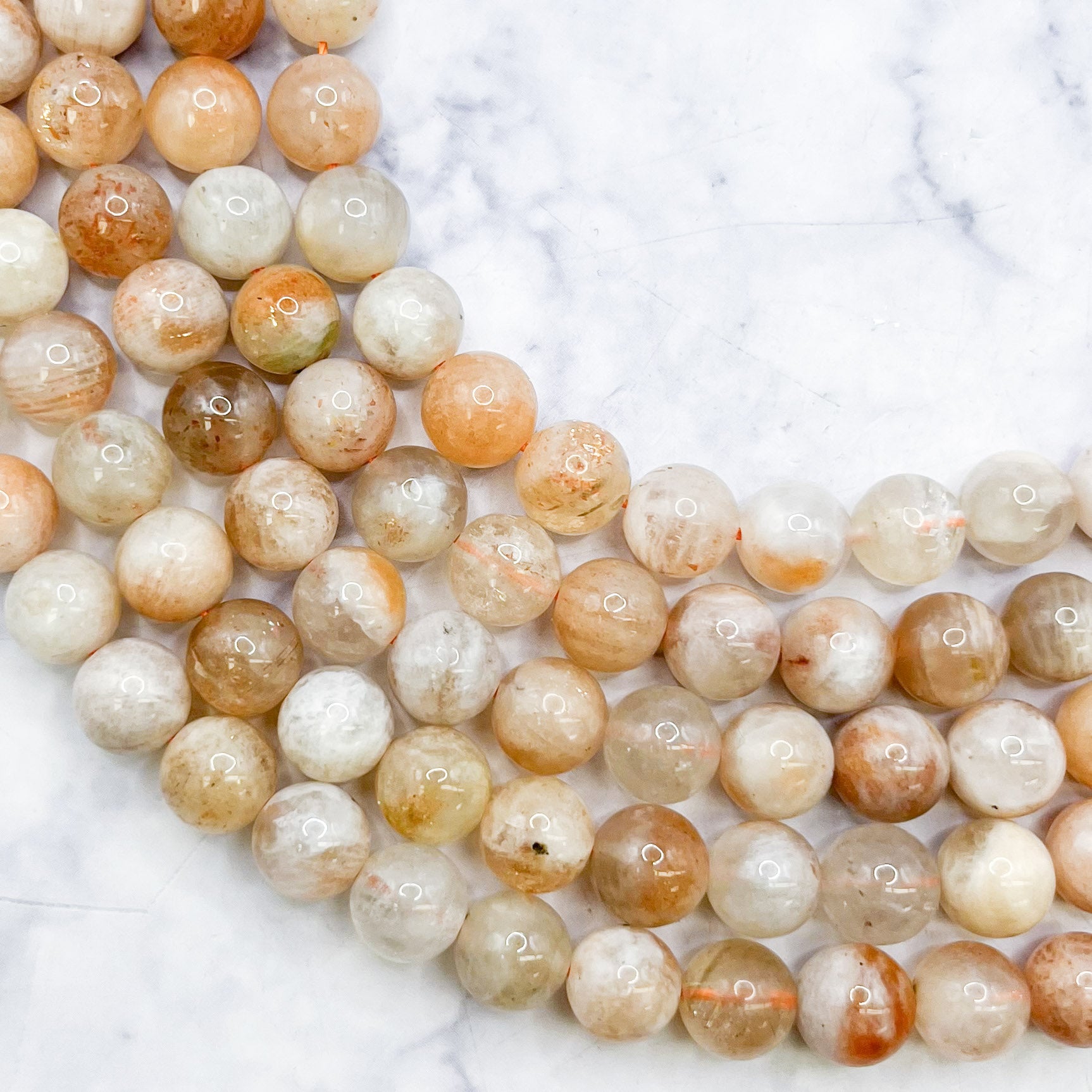 8mm Arusha Sunstone Bead Half Strand F18