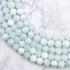 6mm Snowflake Glass Bead Half Strand J12