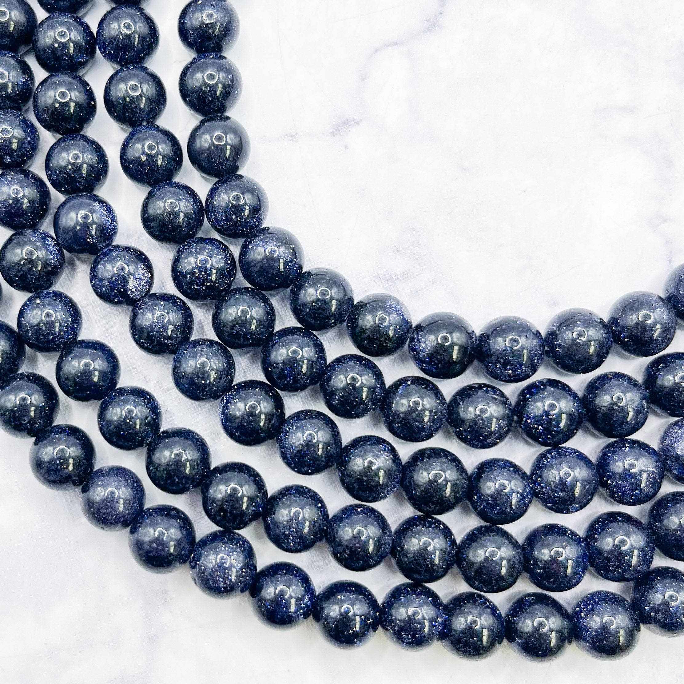 8mm Navy Goldstone Bead Strand K10