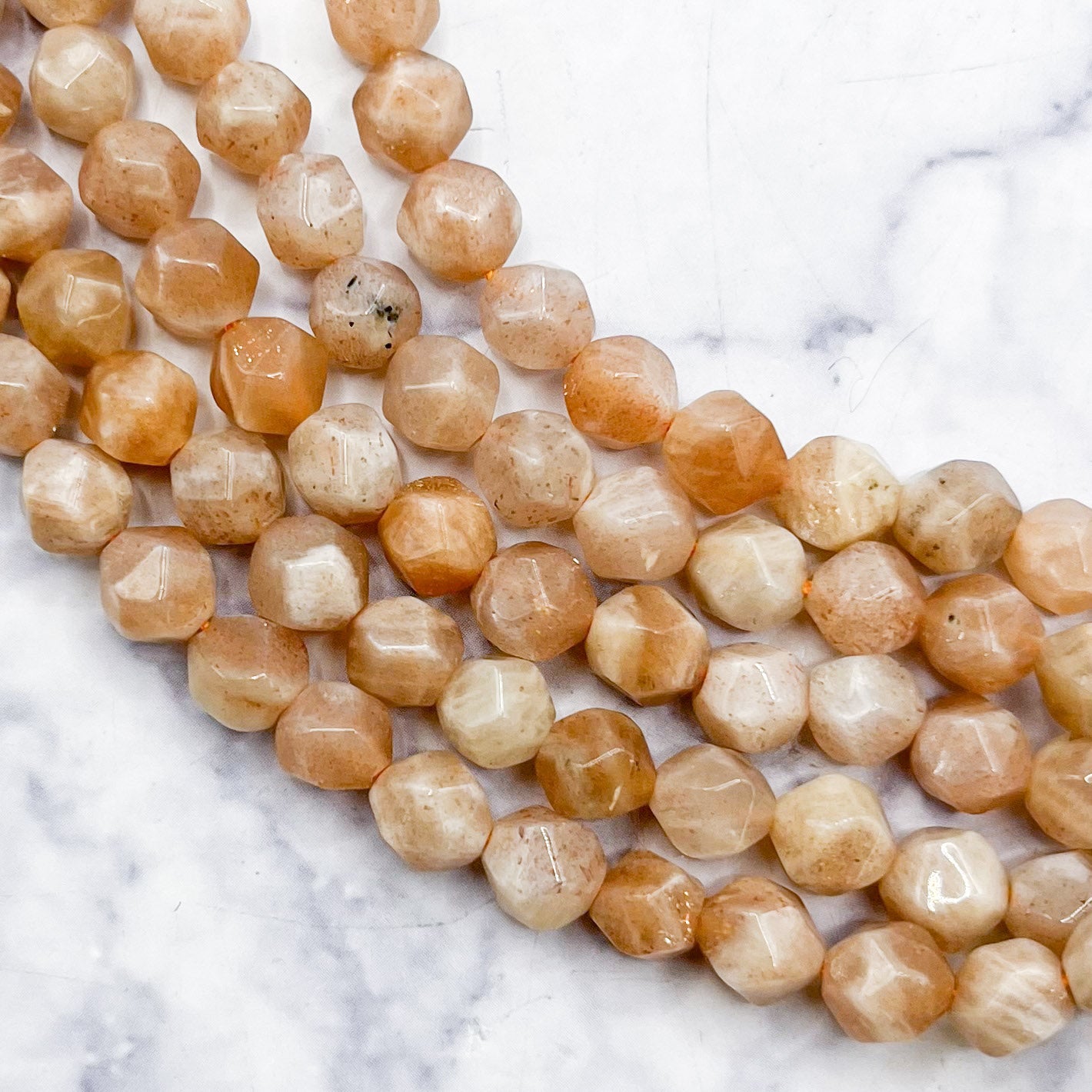 6mm Sunstone Polygon Bead Half Strand F16