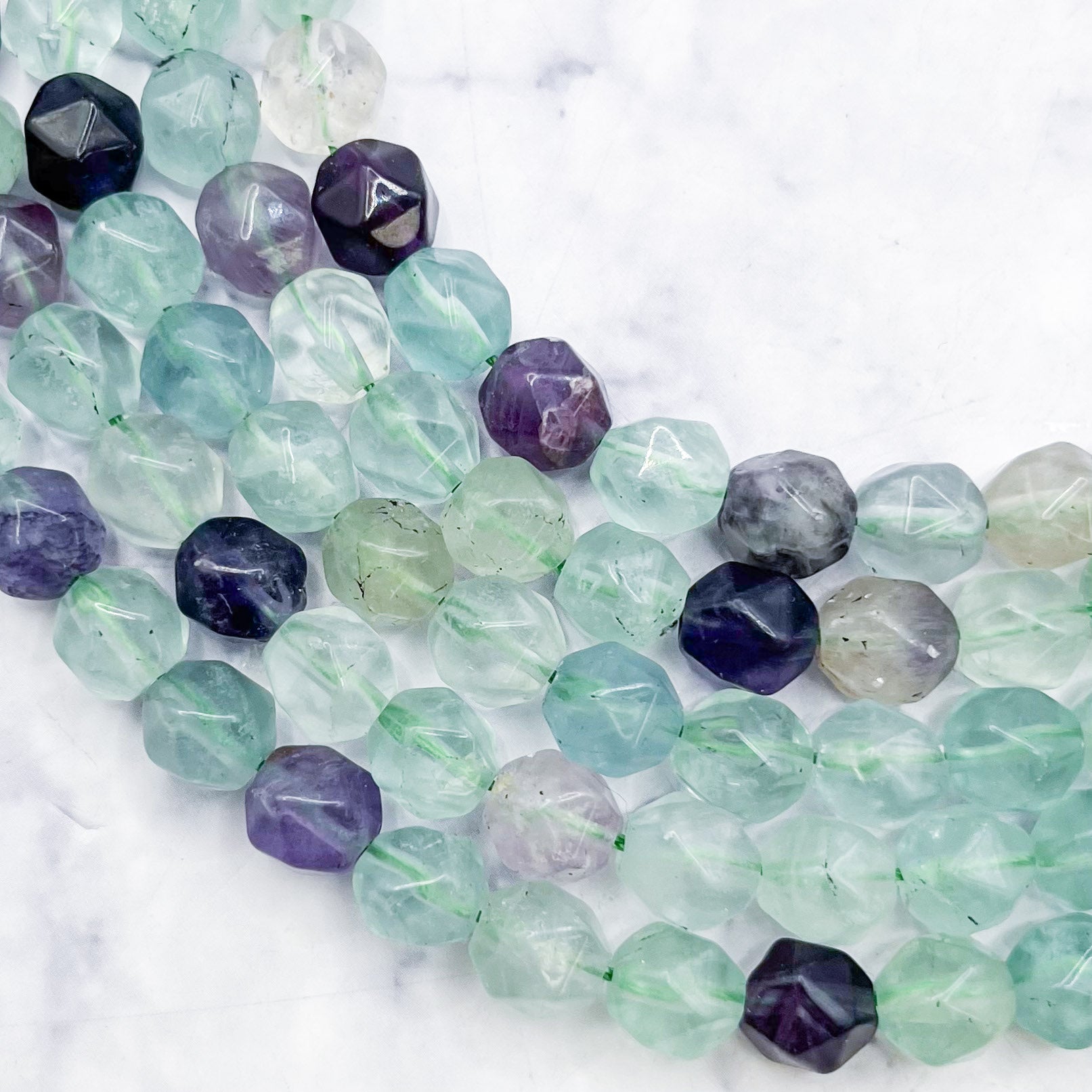 8mm Rainbow Fluorite Polygon Bead Half Strand U14