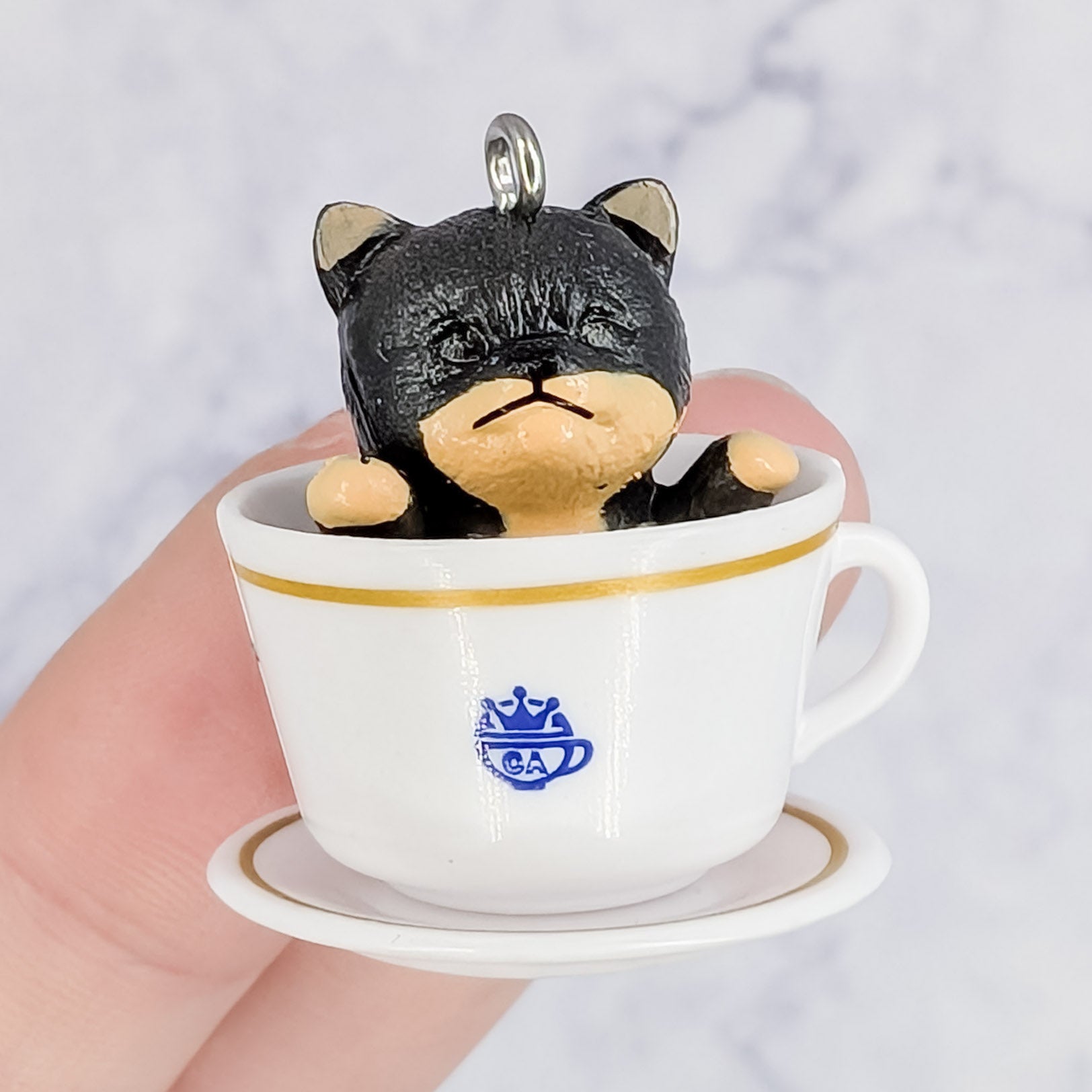 31mm Black and Brown Dog in Teacup Pendant J45