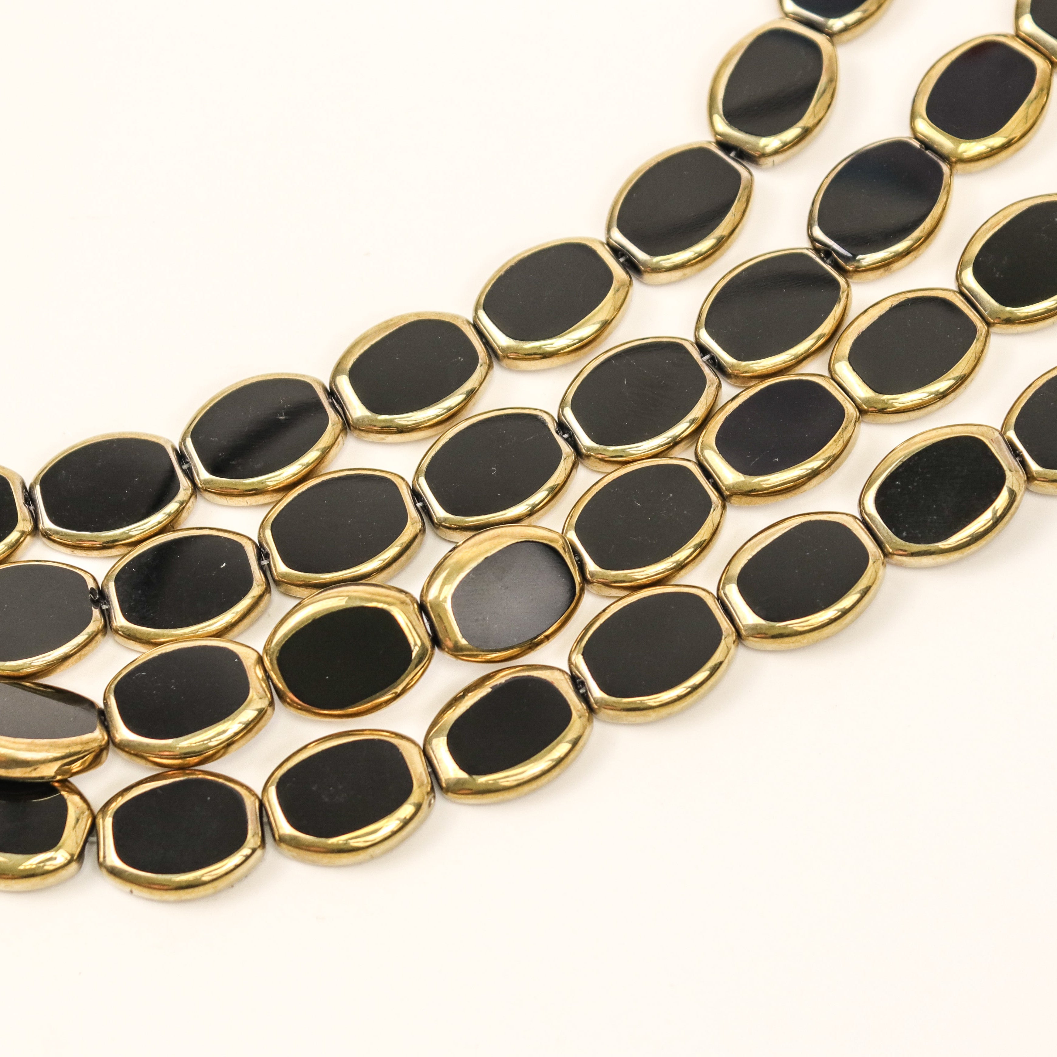 17x14mm Black Gold-Dipped Oval Crystal Bead Half Strand $4.00