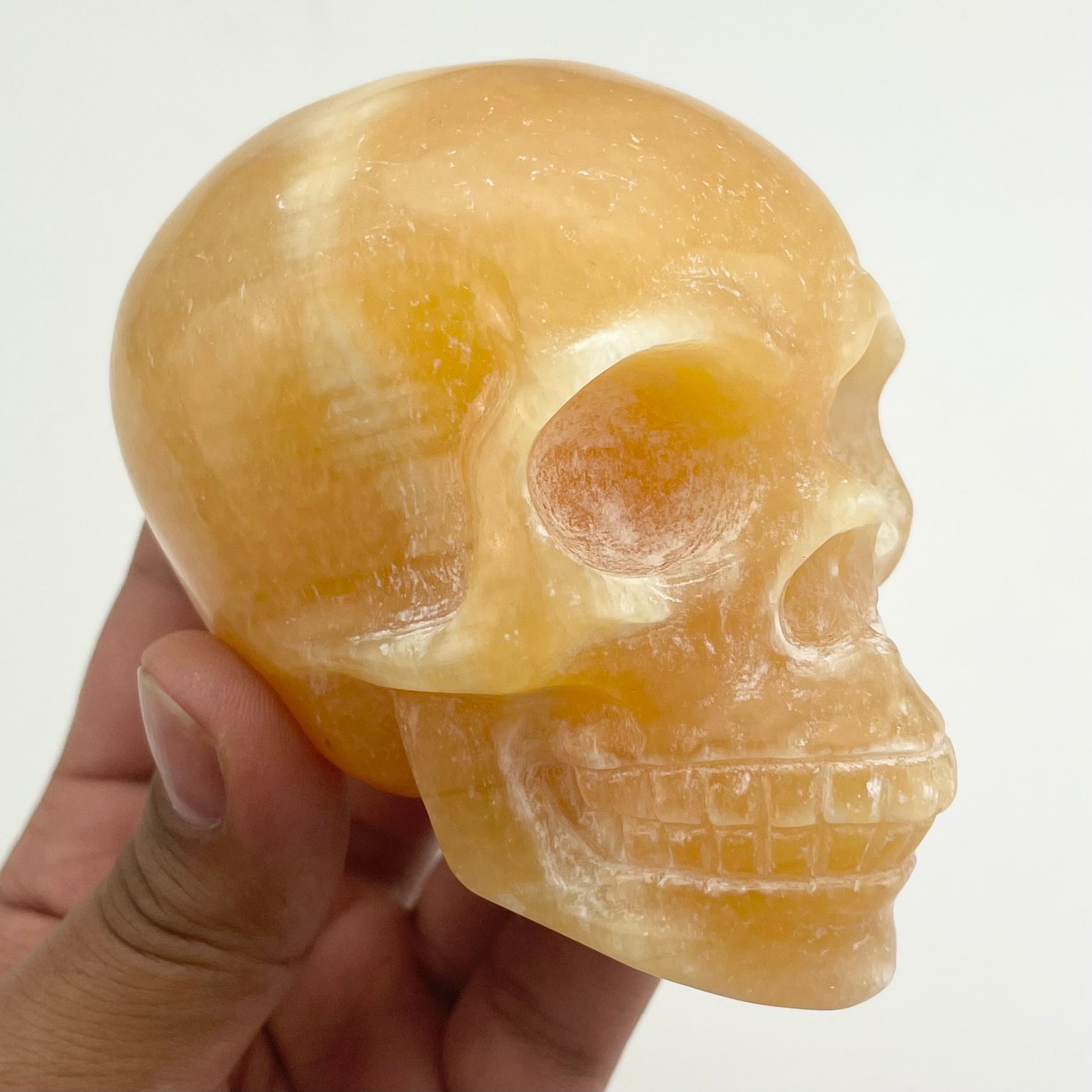 3.25 Inch Orange Calcite Skull I190