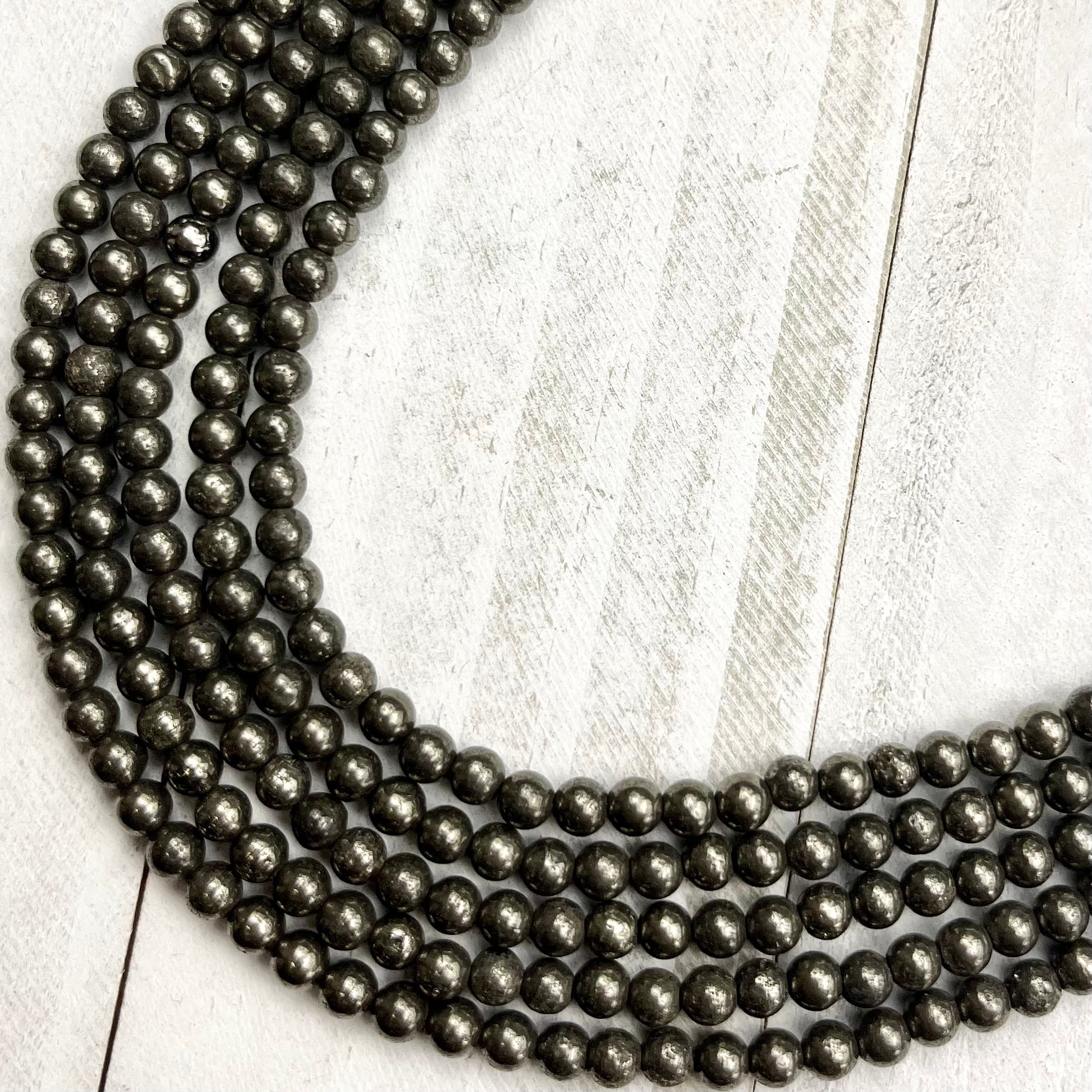 4mm Pyrite Bead Strand F10